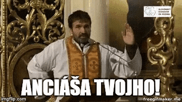a man with a beard is sitting on a throne with a microphone and says anciasa tvojho !