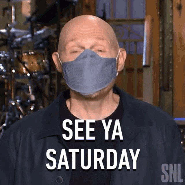 a bald man wearing a mask says " see ya saturday "