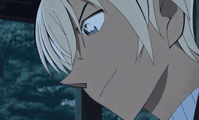 a close up of a cartoon character 's face with a blue eye