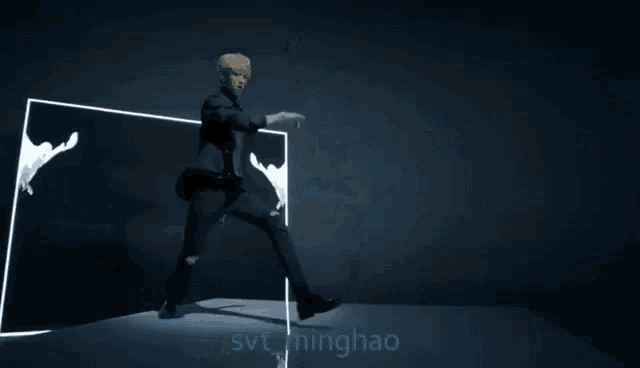 a man is dancing in front of a sign that says svt_magic
