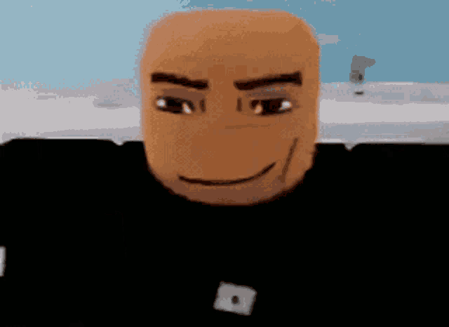 a close up of a cartoon face with a smile on it .