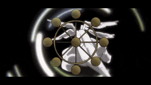 a person in a white robe is surrounded by a circle of spheres .