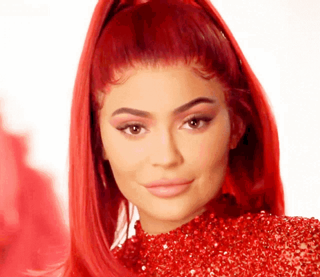 a close up of a woman with red hair