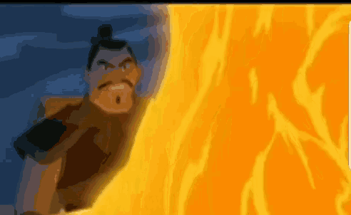 a man with a mustache is standing in front of a large orange fire .