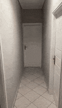 a narrow hallway with a white door and a tiled floor