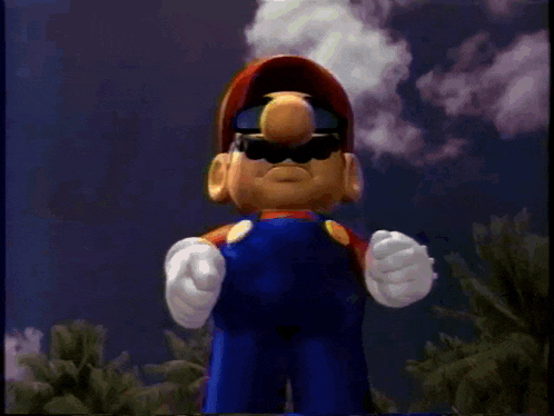 a close up of mario 's face with a m on his hat