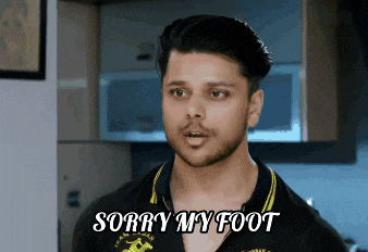 a man says " sorry my foot " while standing in a kitchen