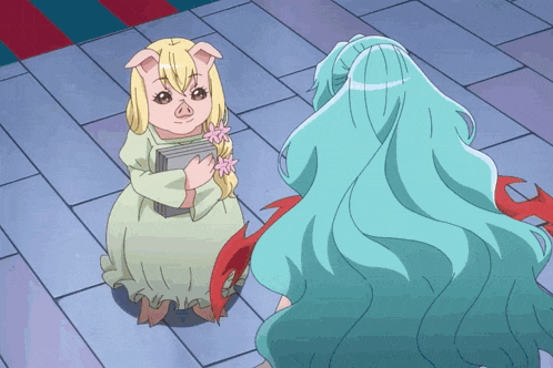 a girl with pig ears holds a book next to a girl with blue hair