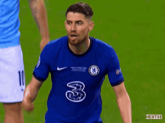a soccer player with the number 3 on his shirt