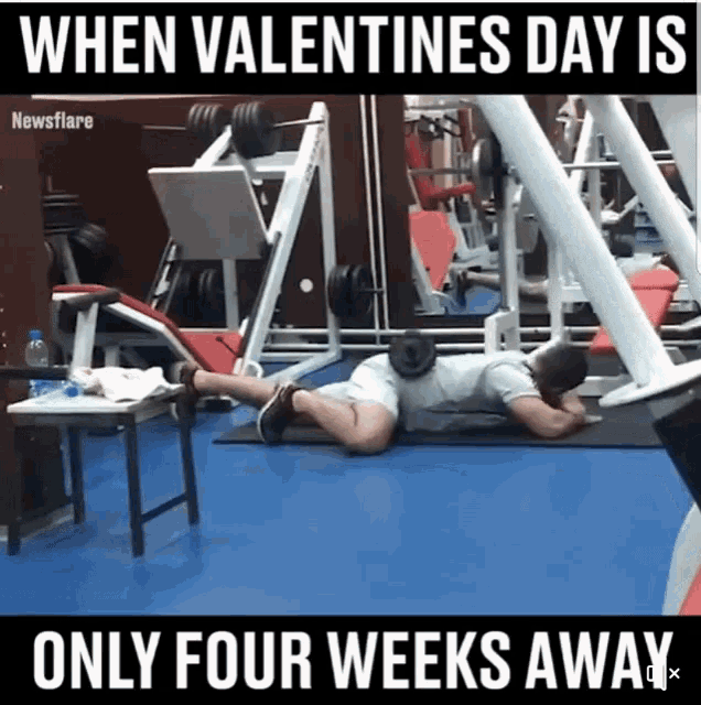 a man is laying on the floor in a gym with the caption when valentine 's day is only four weeks away