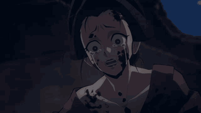 a woman with blood on her face is crying in a dark room