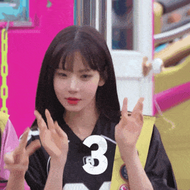 a girl with the number 3 on her shirt