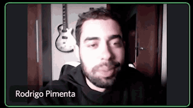 a man with a beard and the name rodrigo pimenta on his screen