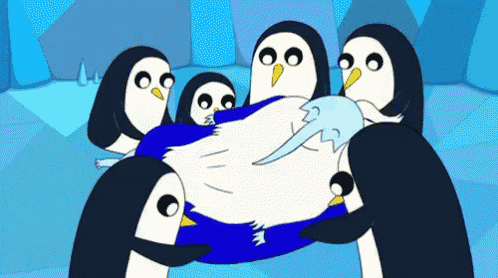 a group of penguins holding a penguin in their arms