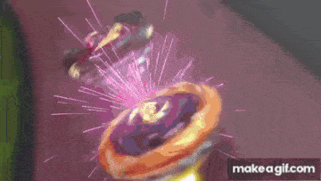 a couple of spinning tops are fighting each other on a track in a video game .