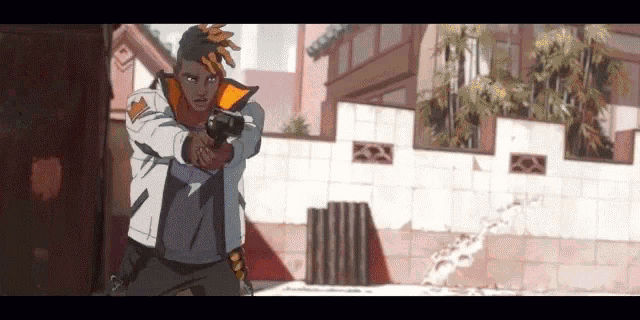 a cartoon of a man holding a gun in front of a wall .