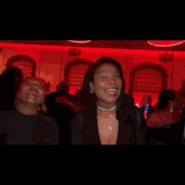 a blurry photo of a man and a woman in a club