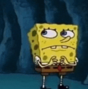 a spongebob squarepants character with a sad face is standing in the water .