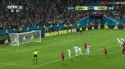 a soccer game is being played in front of a sign that says " unleash speed in x18 "