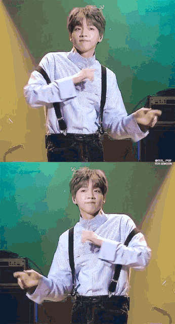 a young man wearing suspenders and a blue shirt is dancing