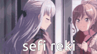 a couple of anime girls are standing next to each other and talking to each other .