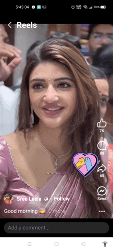 a screenshot of a woman 's face with the words reels on the top left