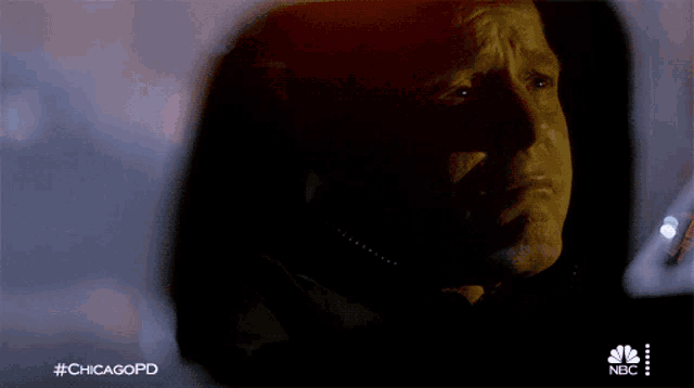 a close up of a man 's face with the hashtag #chicagopd on the bottom