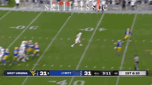 a football game between west virginia and pittsburgh is in progress