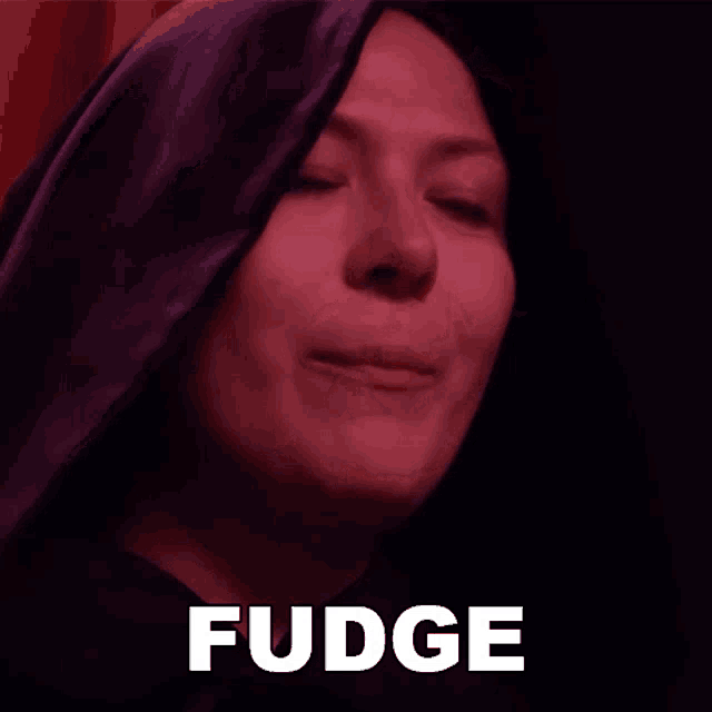 a woman with her eyes closed and the word fudge on the bottom right