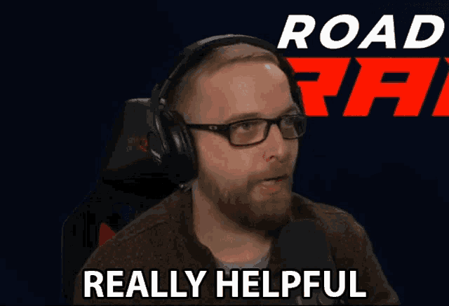 a man wearing glasses and headphones says " really helpful "