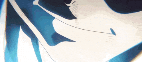 a close up of a person 's face with a blue background and a shadow on it .