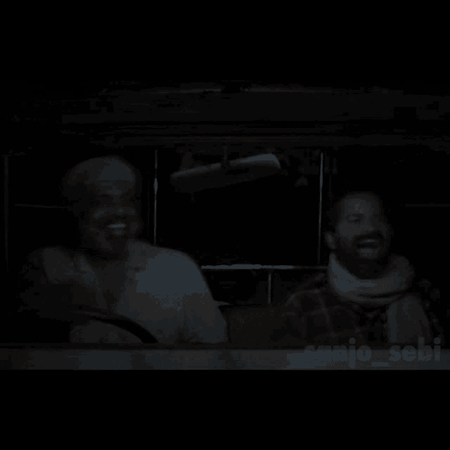 two men are laughing in a dark room with a watermark that says 4anjo_666