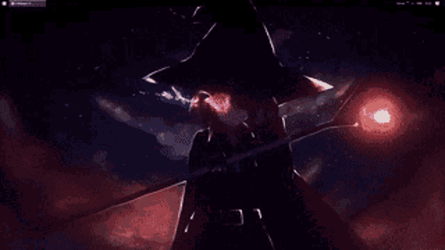 a man in a witch 's hat is holding a magic wand in his hand .