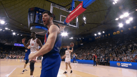 a basketball player with the number 10 on his jersey is celebrating