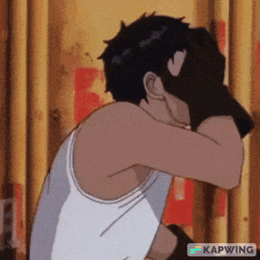 a man is covering his face with his hands while wearing a white tank top .
