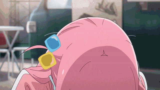 a girl with pink hair has a triangle in her hair clip