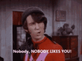 a man in a red sweater is saying nobody nobody likes you