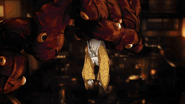 a cartoon character is hanging upside down from a giant monster