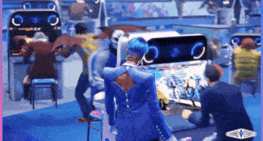 a man with blue hair is playing a video game in a room with a sign that says clown event