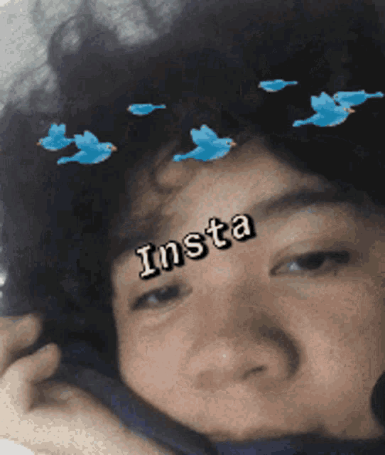 a close up of a person with the word insta on their face