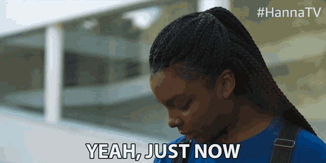 a woman says " yeah just now " while looking down