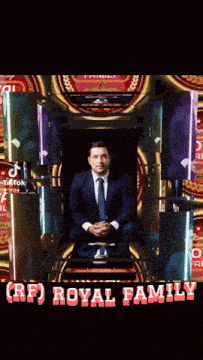 a man in a suit and tie is sitting on a throne with the words royal family written below him