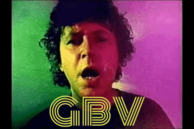 a woman with a surprised look on her face with gbv written on the screen
