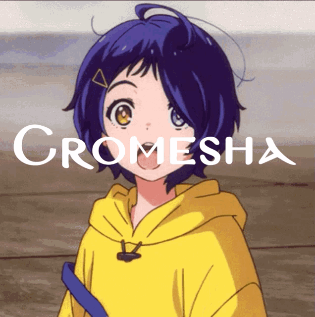 a girl in a yellow hoodie with the word cromesha on the bottom