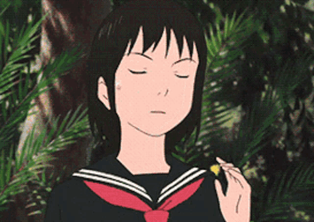 a girl with her eyes closed is wearing a sailor suit