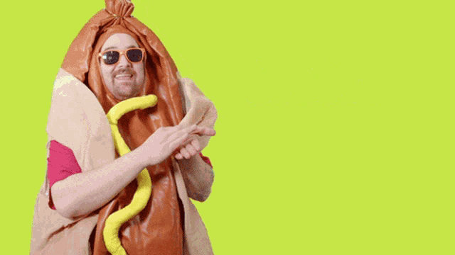 a man in a hot dog costume with the words cash that check below him
