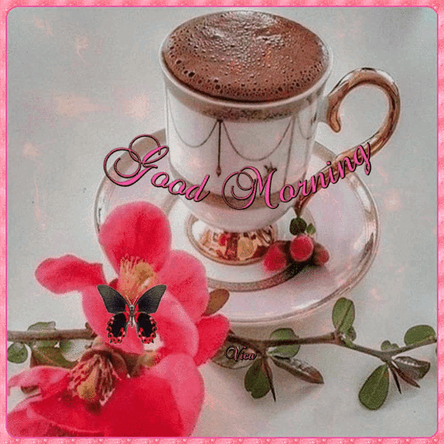 a cup of coffee on a saucer with the words " good morning " written on it