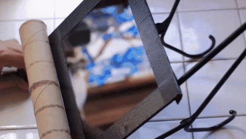 Looking To Make A Tablet Stand On The Cheap? Save Yourself $50 And Grab A Pair Of Hangers. GIF - Tablet Stand Electronics Diy GIFs