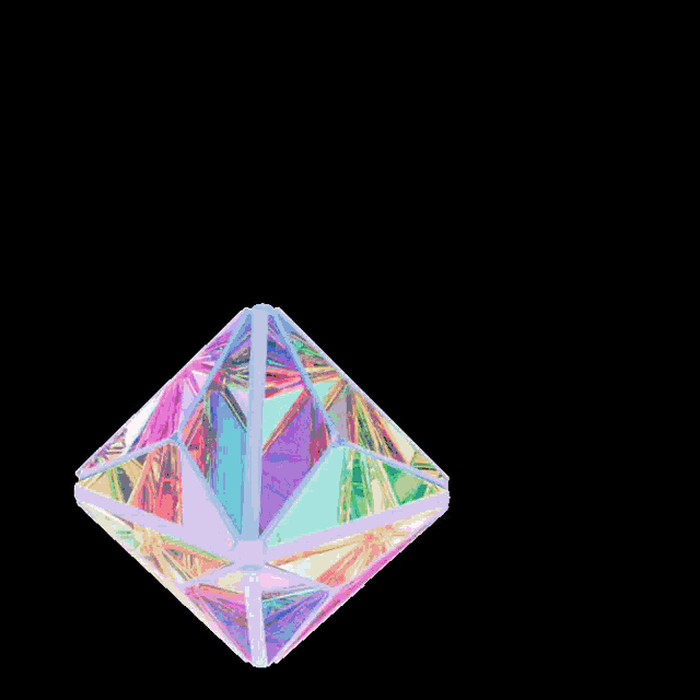 a green diamond on a black background that looks like a rainbow