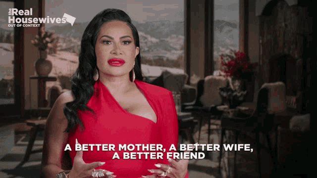 a woman in a red dress with the words a better mother a better wife a better friend